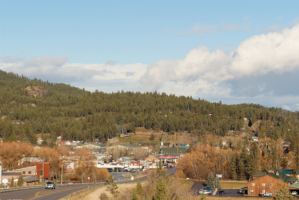 Lakeside town and forested hillside along Highway 93, December 2013